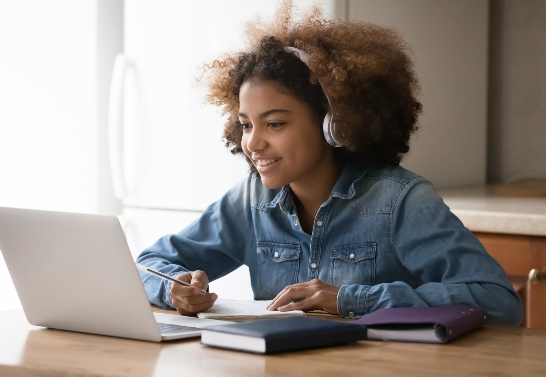 teenage student girl chatting online with teacher
